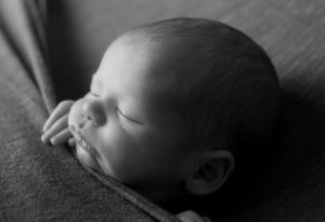 Tucson's best doula, black and white photo of a newborn